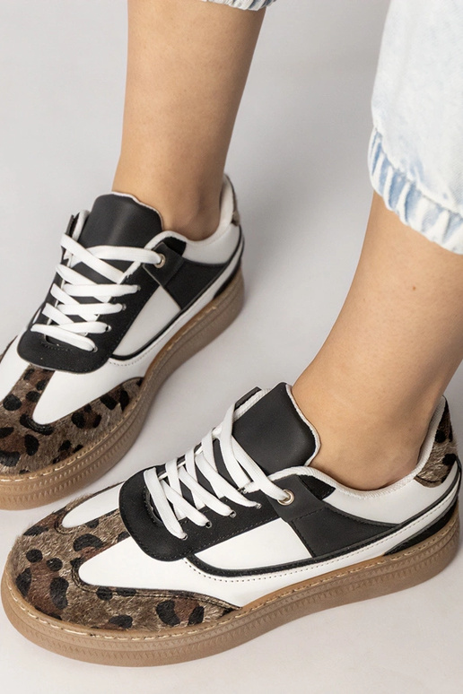 Scarpe sportive bianche e nere con...