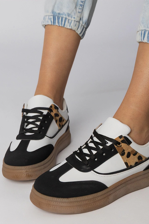 Scarpe sportive bianche e nere con...