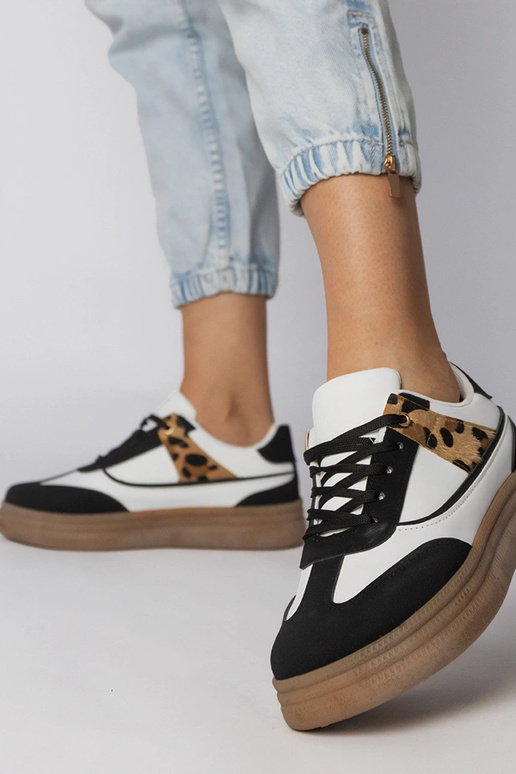 Scarpe sportive bianche e nere con...