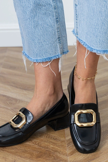 Mezzi stivali neri da donna...