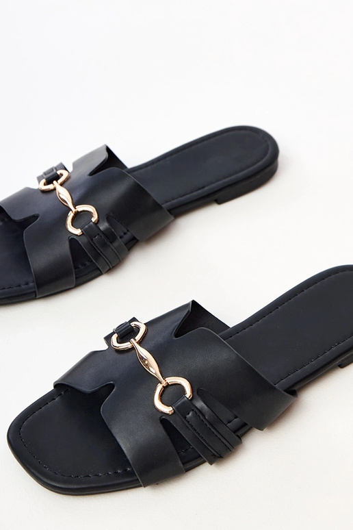 Panto neri con decorazione dorata...