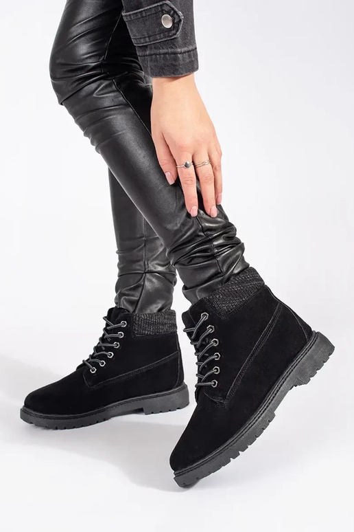 Le scarpe da donna sono realizzate in...