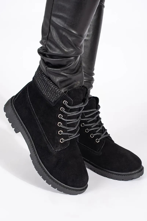 Le scarpe da donna sono realizzate in...