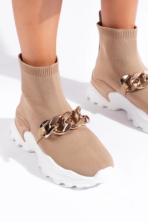 Scarpe modello sneakers con catena...