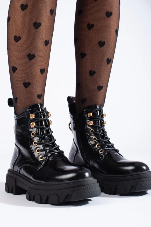 stivali da donna con effetto laccato...