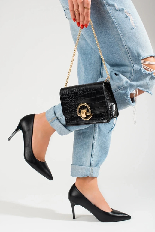 Modello classico tacco alto nero con... Modello classico tacco alto nero con...