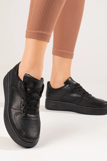 scarpe sportive nere... 2