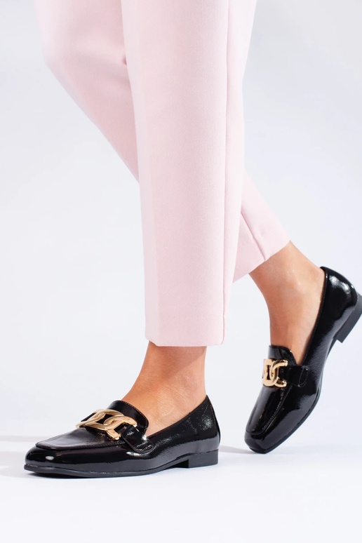 Stivaletti da donna neri effetto... Stivaletti da donna neri effetto...