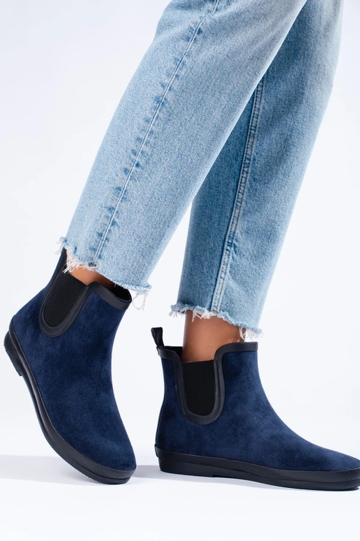 stivali di gomma scamosciata isolati...