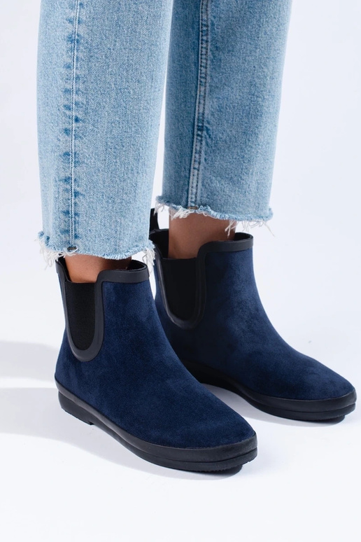 stivali di gomma scamosciata isolati...