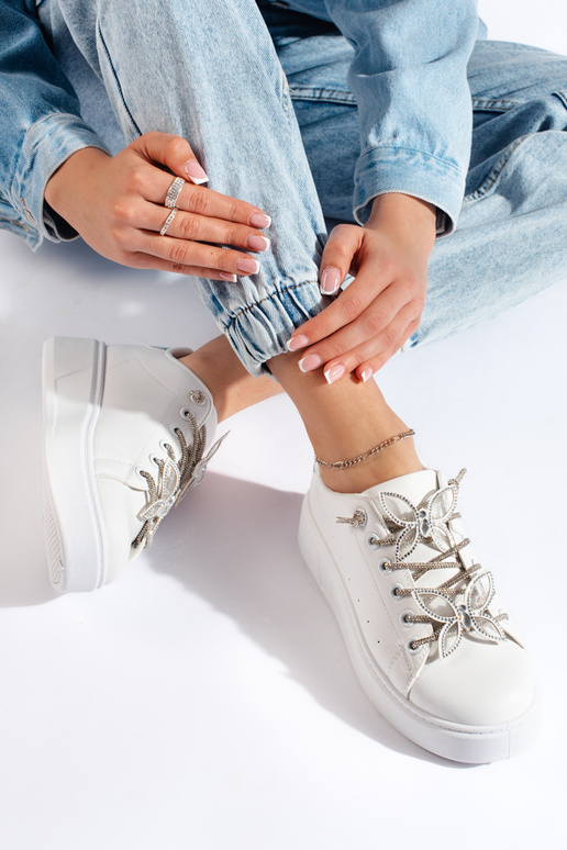 Sneakers bianche con farfalle