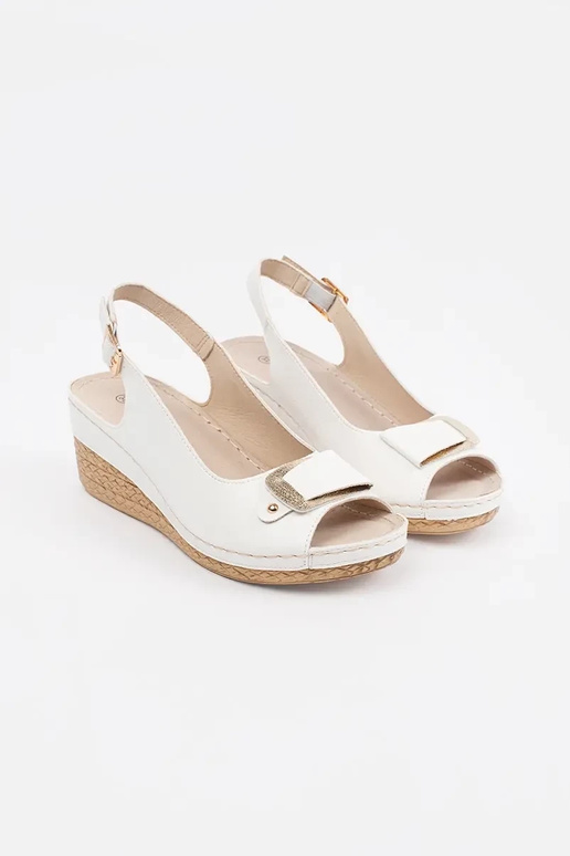 Sandali bianchi con zeppa bassa...