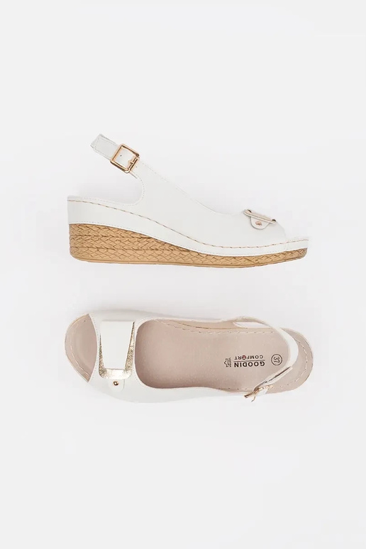 Sandali bianchi con zeppa bassa...