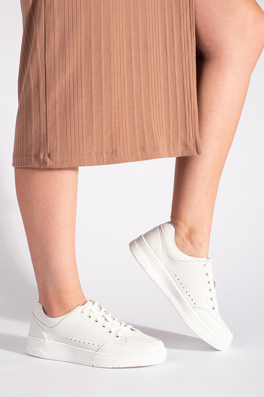 scarpe in pelle bianca con plateau alto