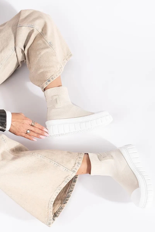 stivali alti con plateau color avorio