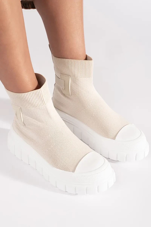 stivali alti con plateau color avorio