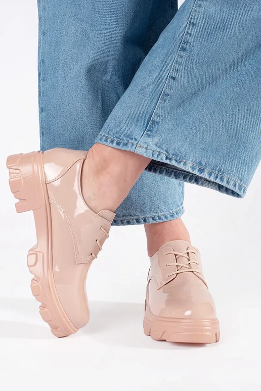 Mezze sole con effetto vernice e plateau Mezze sole con effetto vernice e plateau