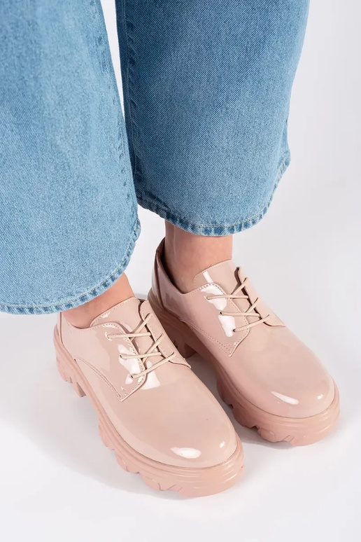 Mezze sole con effetto vernice e plateau Mezze sole con effetto vernice e plateau