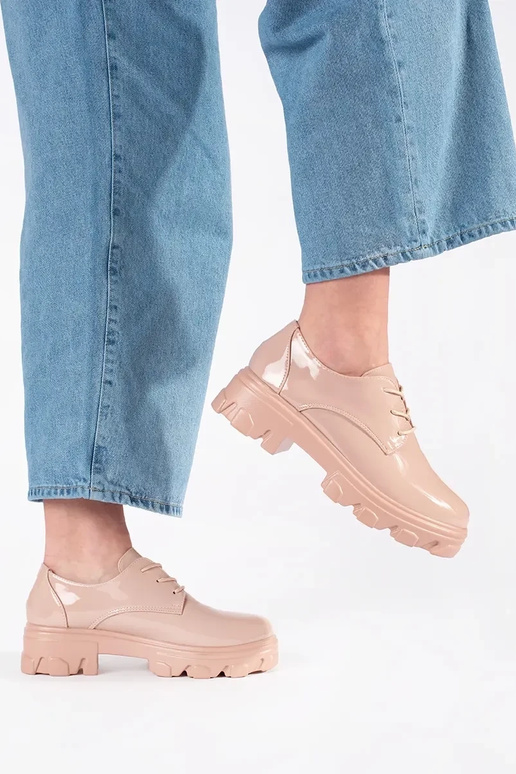 Mezze sole con effetto vernice e plateau Mezze sole con effetto vernice e plateau