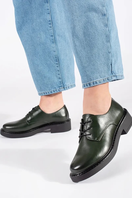 Mezze sole verdi con tacco basso...