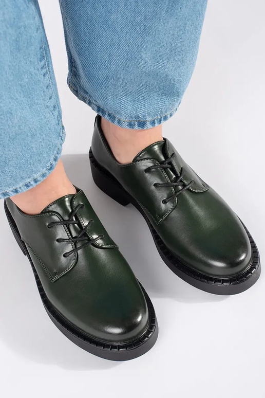 Mezze sole verdi con tacco basso...