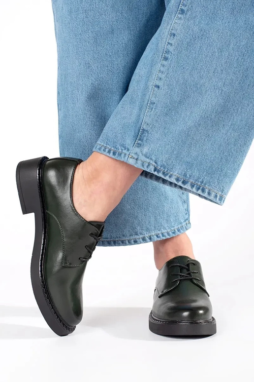 Mezze sole verdi con tacco basso...