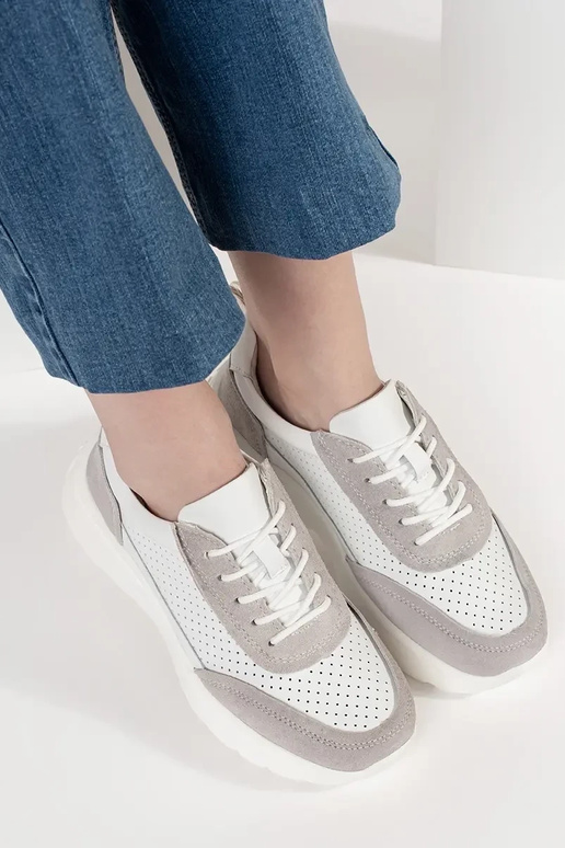 Scarpe sportive in pelle traforata...