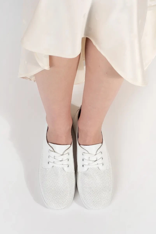 Scarpe sportive traforate in pelle...