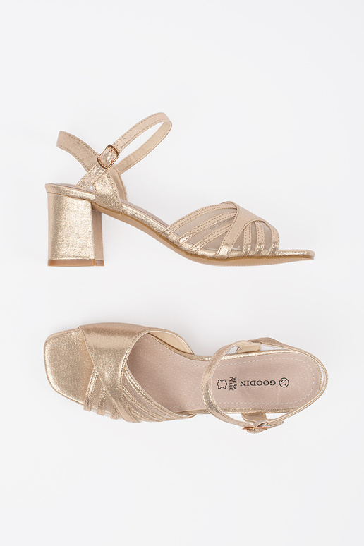 Sandali dorati brillanti con tacco