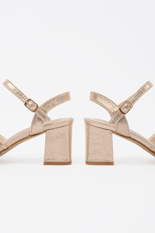 Sandali dorati brillanti con tacco