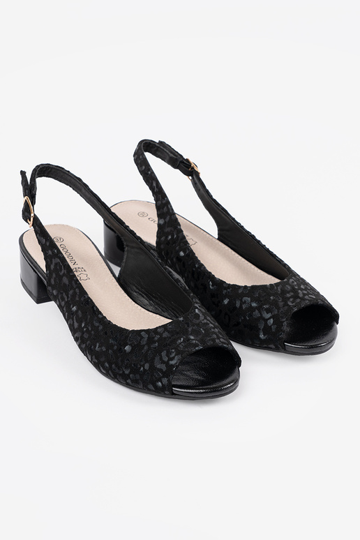 Sandali neri a tacco basso con motivo... Sandali neri a tacco basso con motivo...