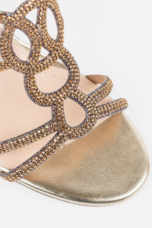 Infradito dorate con tacco, Sergio Leone