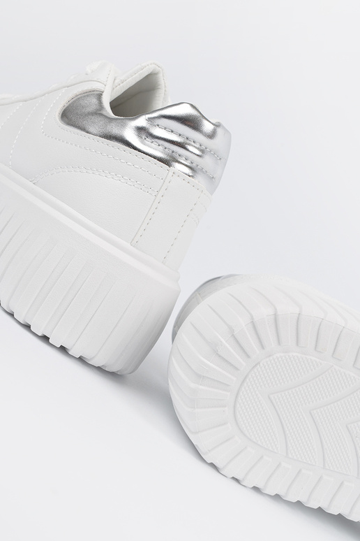 Scarpe sportive bianche con dettagli... Scarpe sportive bianche con dettagli...