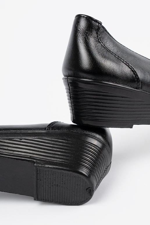 Mocassini bianchi lucidi con fiocco Mocassini bianchi lucidi con fiocco