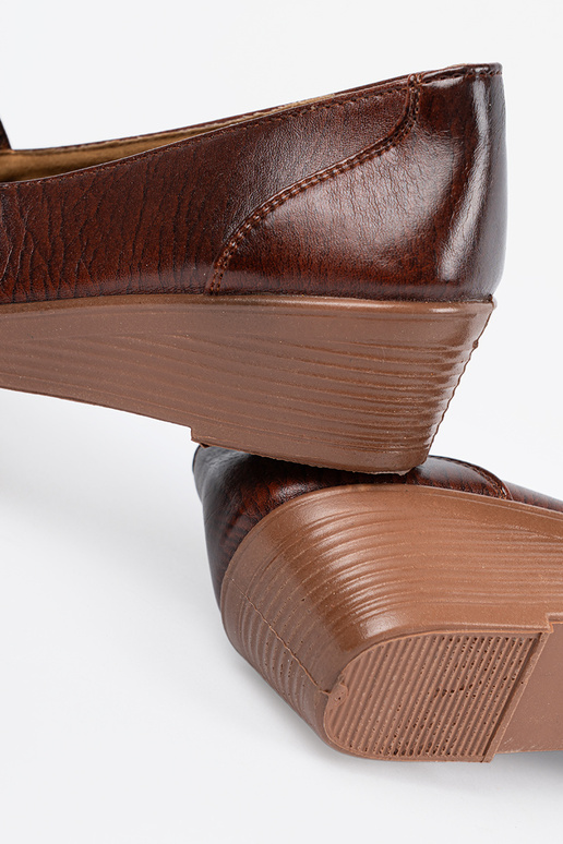 Scarpe con bassa piattaforma