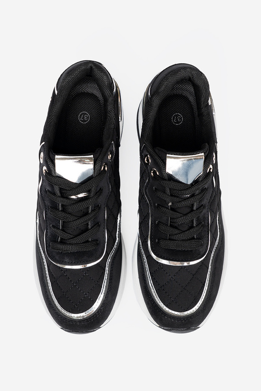 colore nero Scarpe modello sneakers su un cuneo