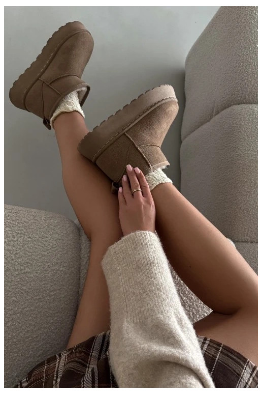 Sneakers nere e bianche con dettagli argentati lucidi