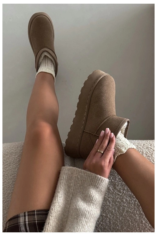 Sneakers nere e bianche con dettagli argentati lucidi