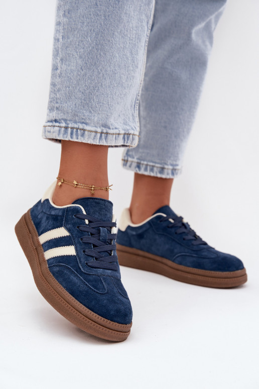 Scarpe modello sneakers Femminile dalla pelle scamosciata con una piattaforma blu scuro Sylviona Scarpe modello sneakers Femminile dalla pelle scamosciata con una piattaforma blu scuro Sylviona