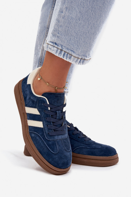 Scarpe modello sneakers Femminile dalla pelle scamosciata con una piattaforma blu scuro Sylviona Scarpe modello sneakers Femminile dalla pelle scamosciata con una piattaforma blu scuro Sylviona