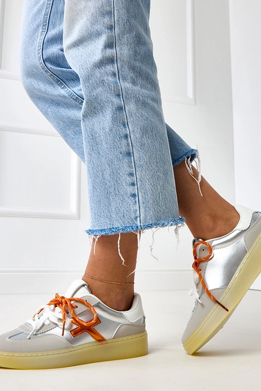 Sneakers argentati con piattaforma e...