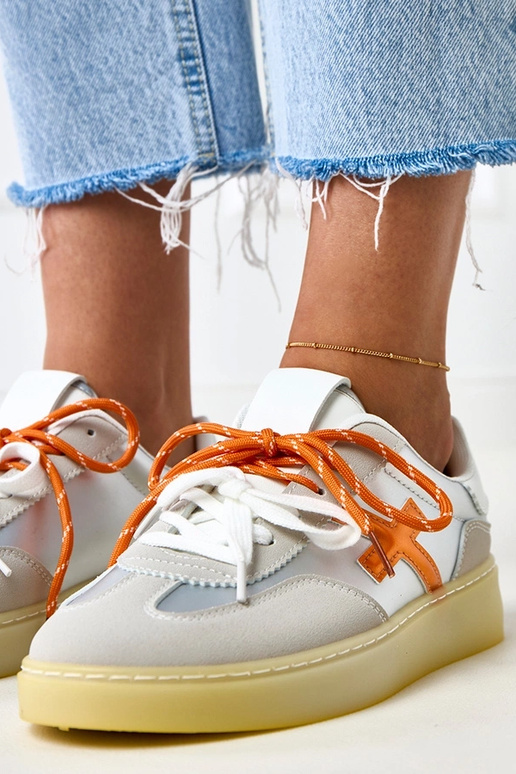 Sneakers argentati con piattaforma e...