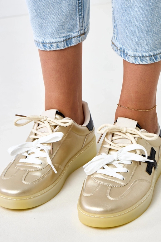 Sneaker dorate con piattaforma e...