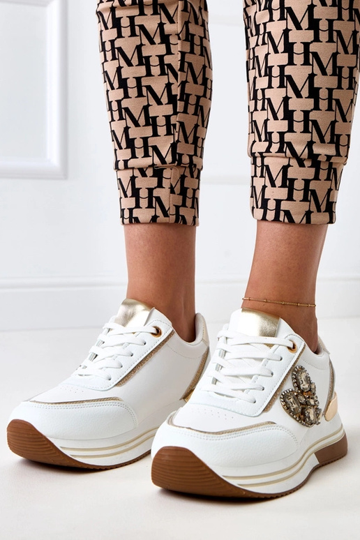 Scarpe sportive bianche con zeppa... Scarpe sportive bianche con zeppa...