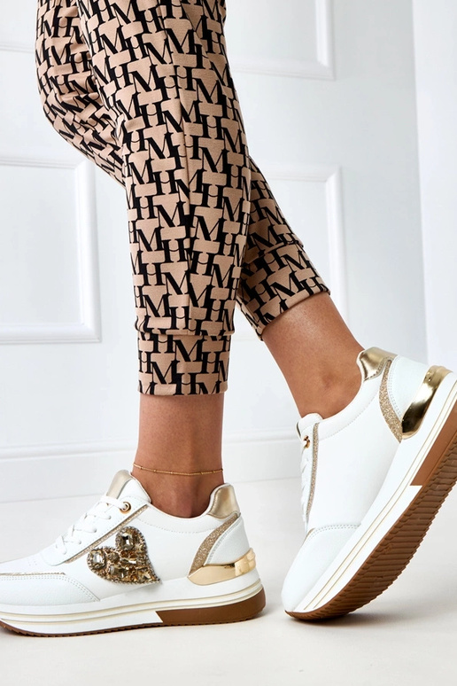 Scarpe sportive bianche con zeppa... Scarpe sportive bianche con zeppa...