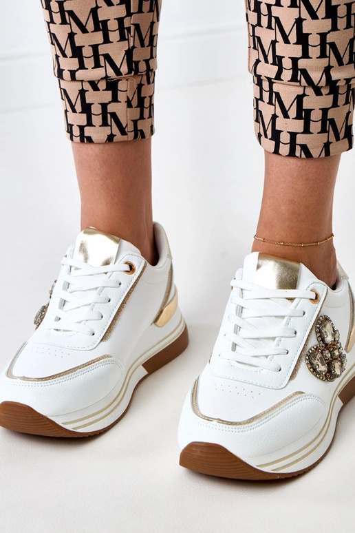 Scarpe sportive bianche con zeppa... Scarpe sportive bianche con zeppa...