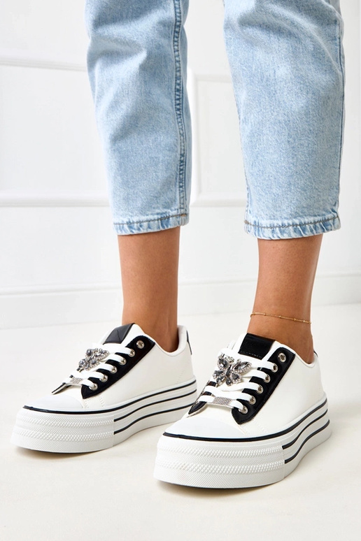 Scarpe sportive bianche con zeppa... Scarpe sportive bianche con zeppa...