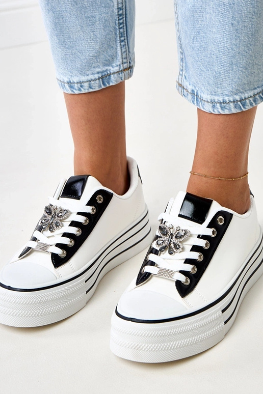 Scarpe sportive bianche con zeppa... Scarpe sportive bianche con zeppa...