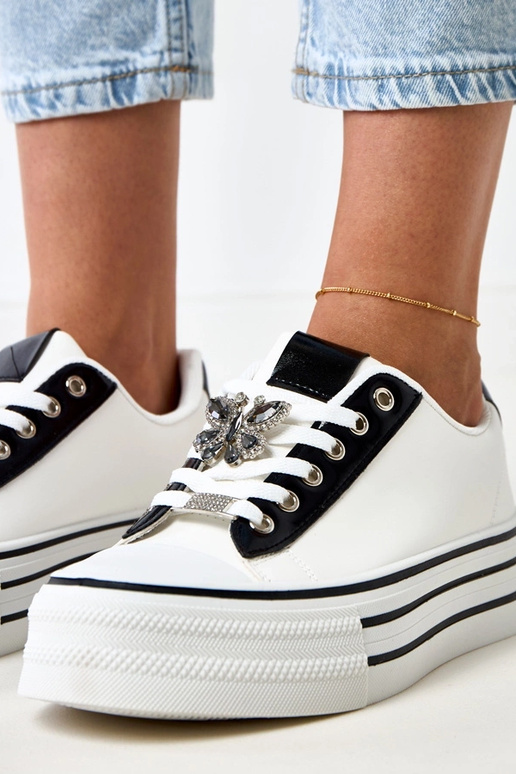 Scarpe sportive bianche con zeppa... Scarpe sportive bianche con zeppa...