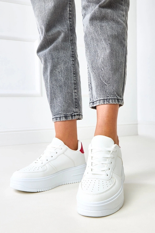 Sneakers bianche con platform e... Sneakers bianche con platform e...